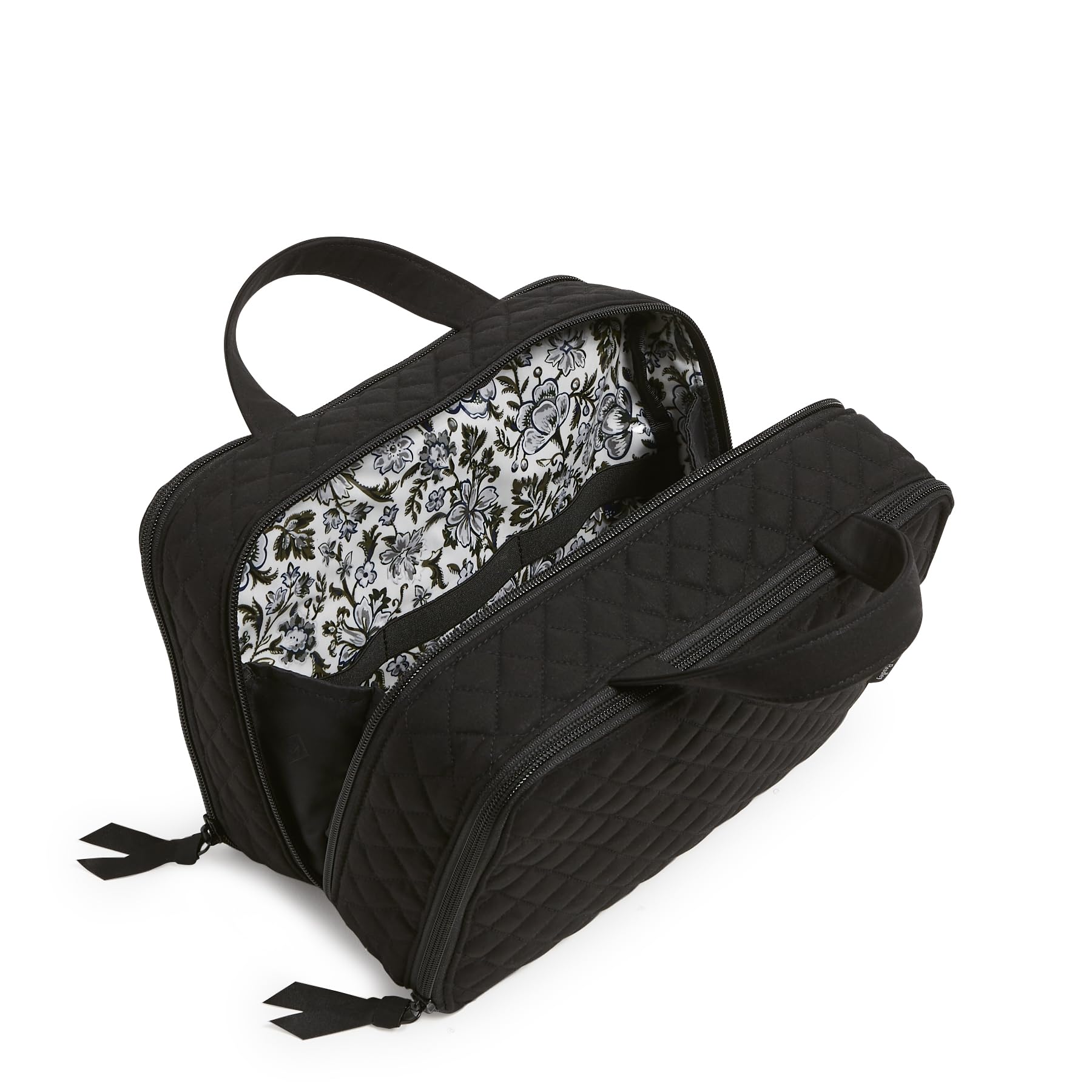 Vera Bradley organizer interior in black with wipeable compartments for cosmetics.