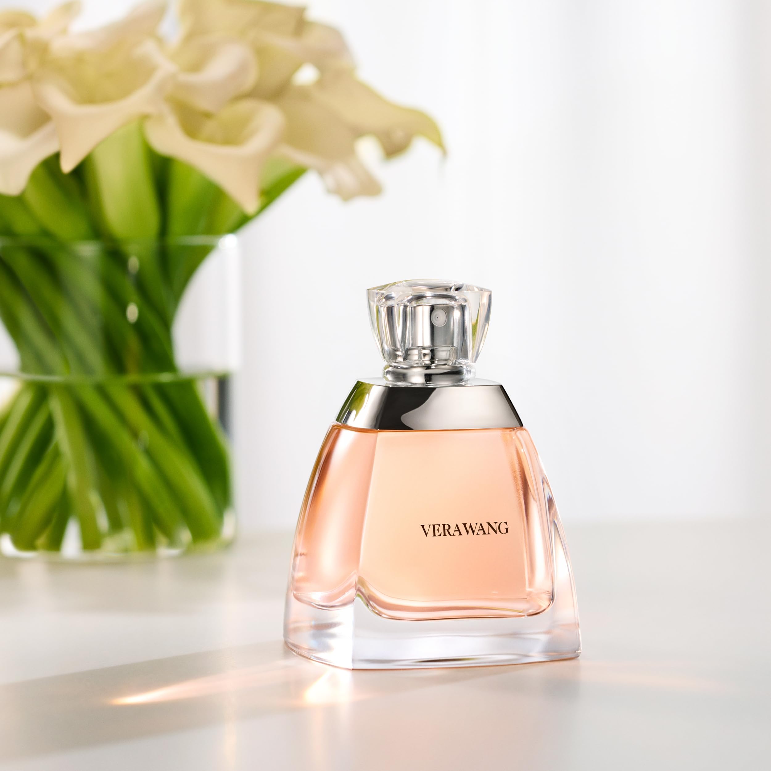 Vera Wang closeup reveals iris and lily nuances for a soft floral mood