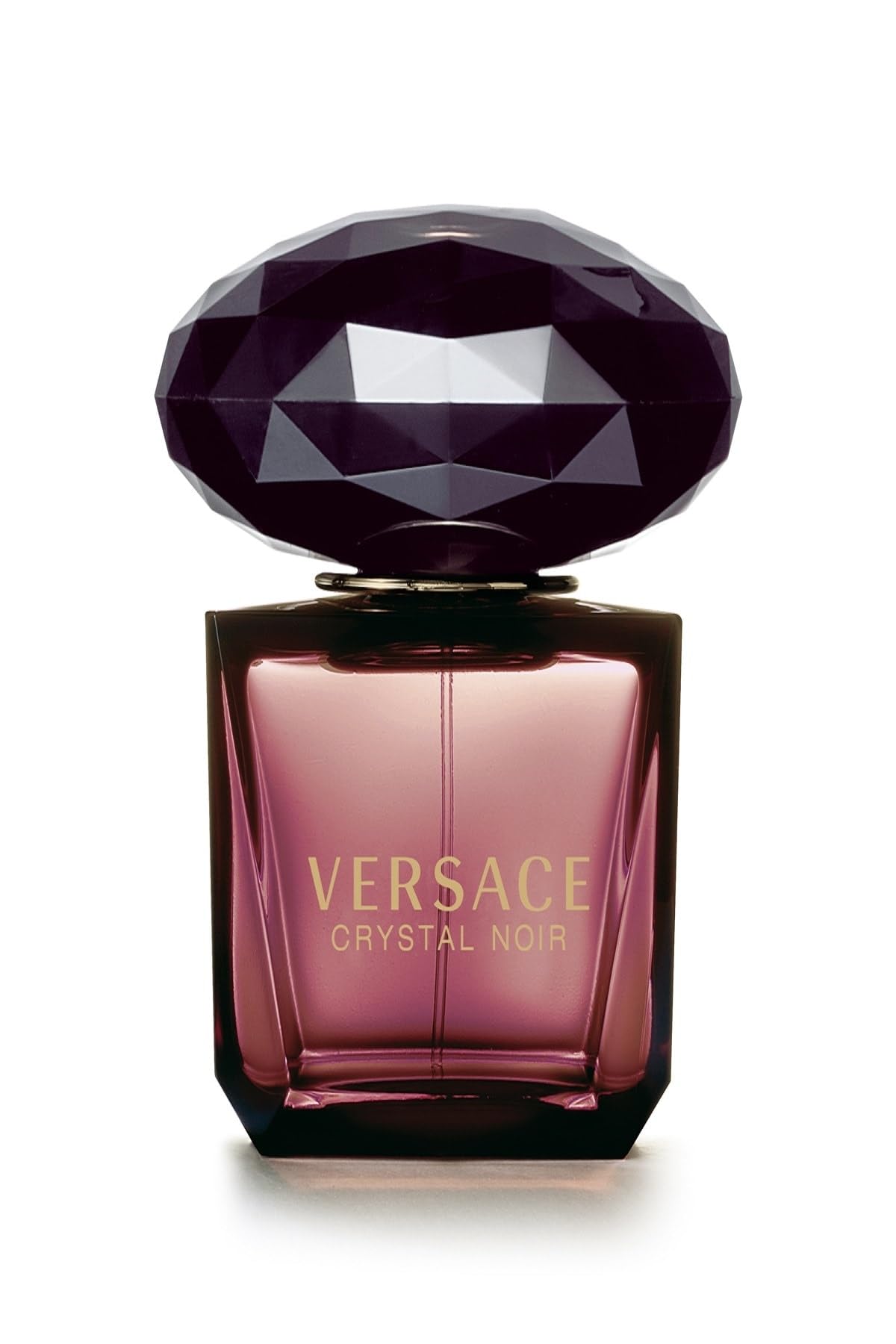 Versace Crystal Noir bottle close-up shows luxurious design for evening wear.