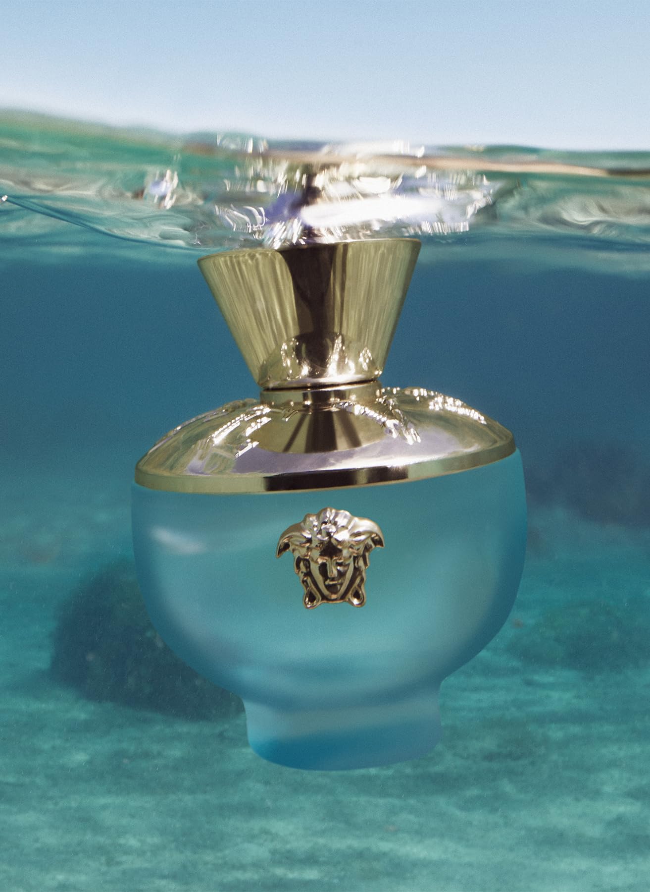 Versace Dylan Turquoise eau de toilette spray demonstrates light daytime wear.