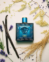 Versace Eros Parfum Spray on dresser scene implies signature scent for evenings.