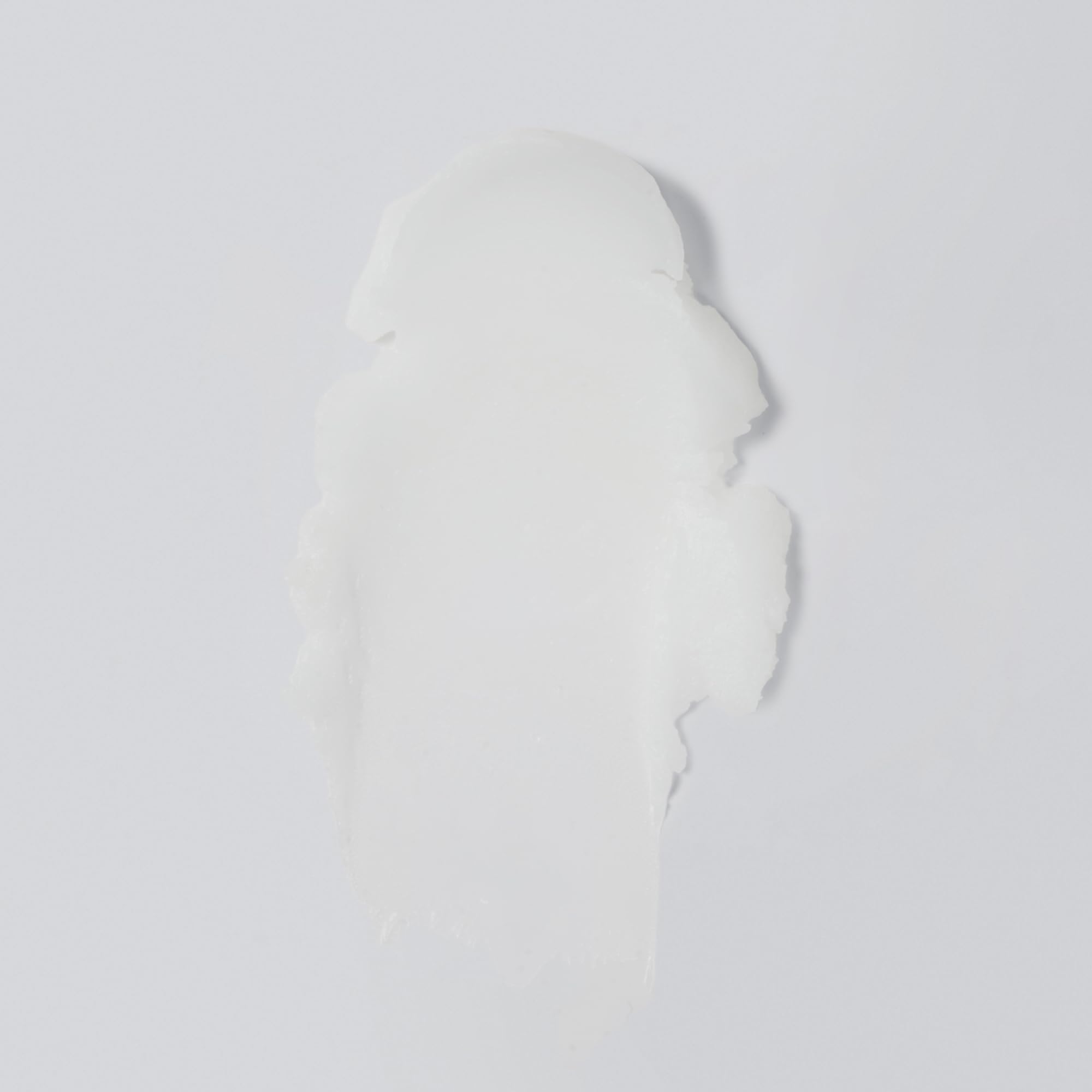 Versed Day Dissolve balm on wet hands showing makeup-melting action