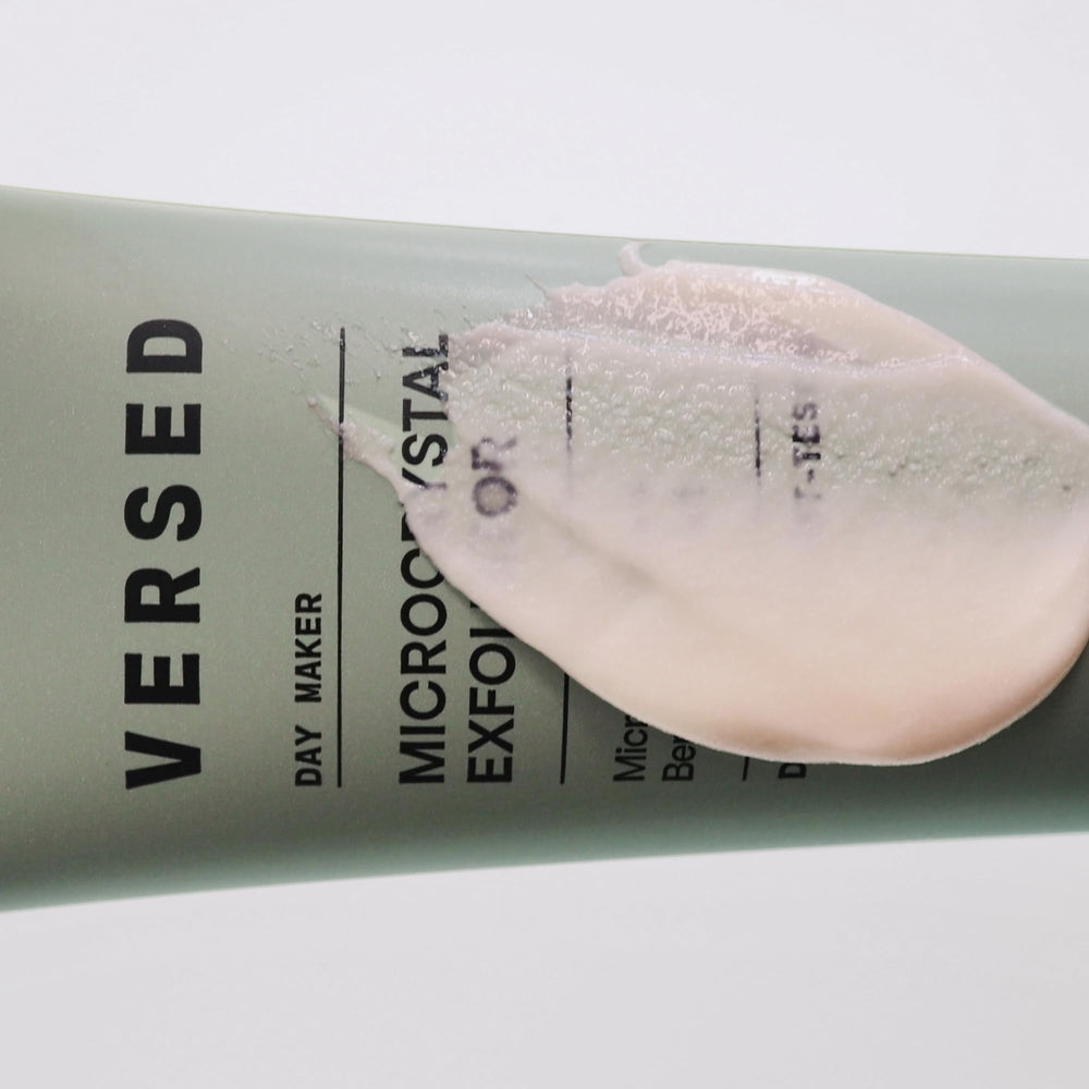 Creamy cleanser on hand showing rich texture of Day Maker.