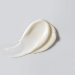 Versed Good Defense Sunscreen dewy finish swatch showing glow