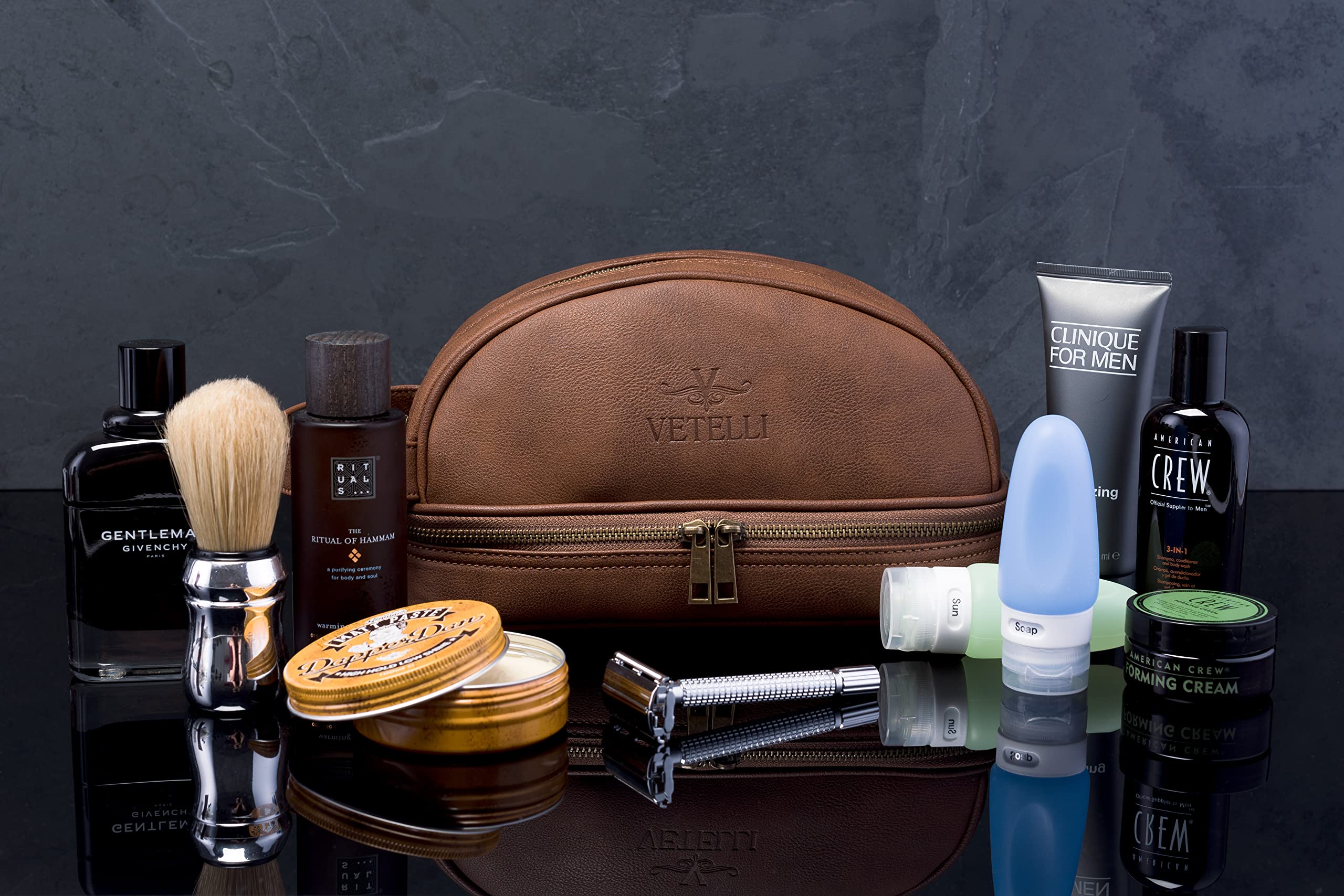 Vetelli Classic Leather Dopp Kit mesh bottle pouches keep toiletries secure.