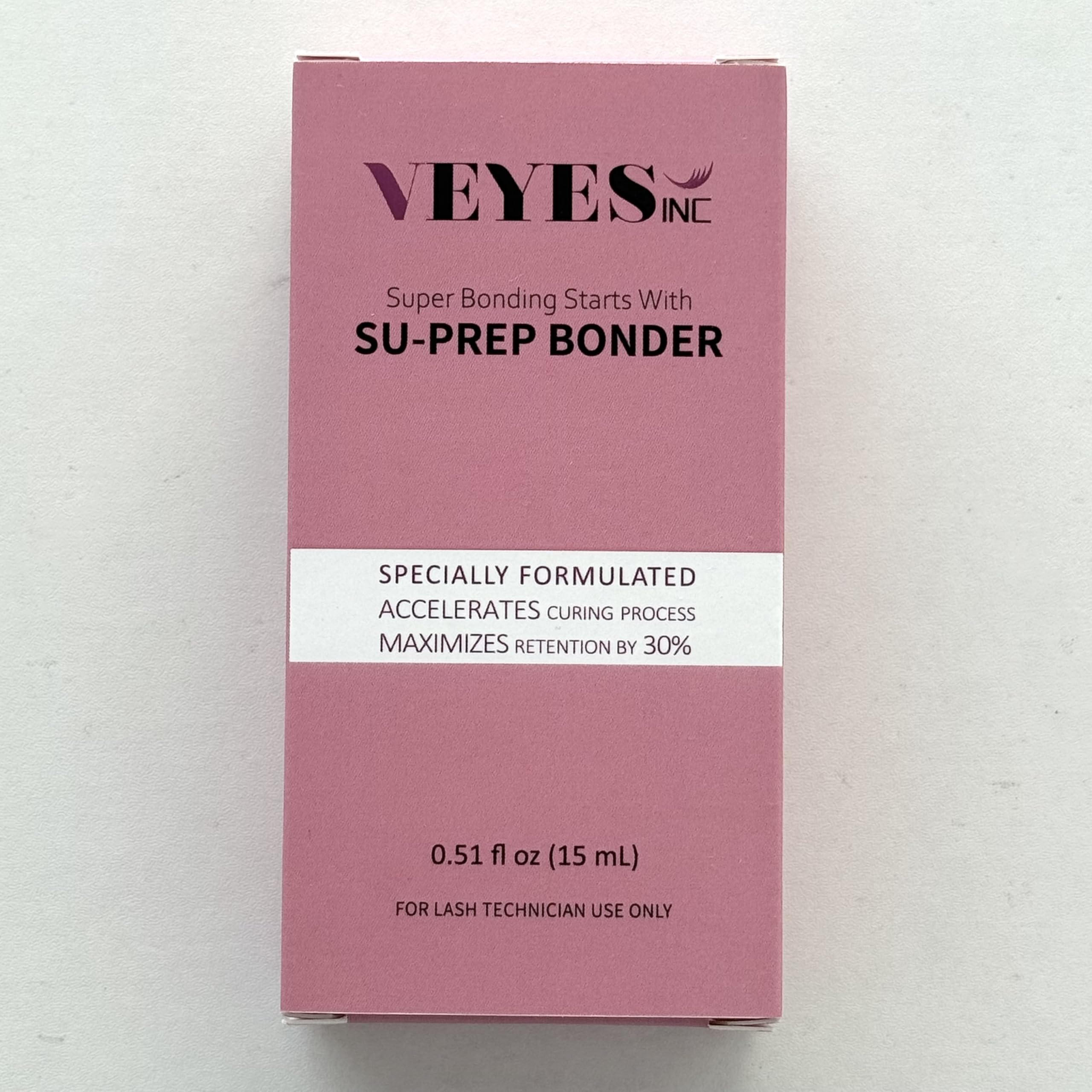 VEYES INC Super Lash Bonder clear finish on lashes suggests seamless adhesion and a natural look.