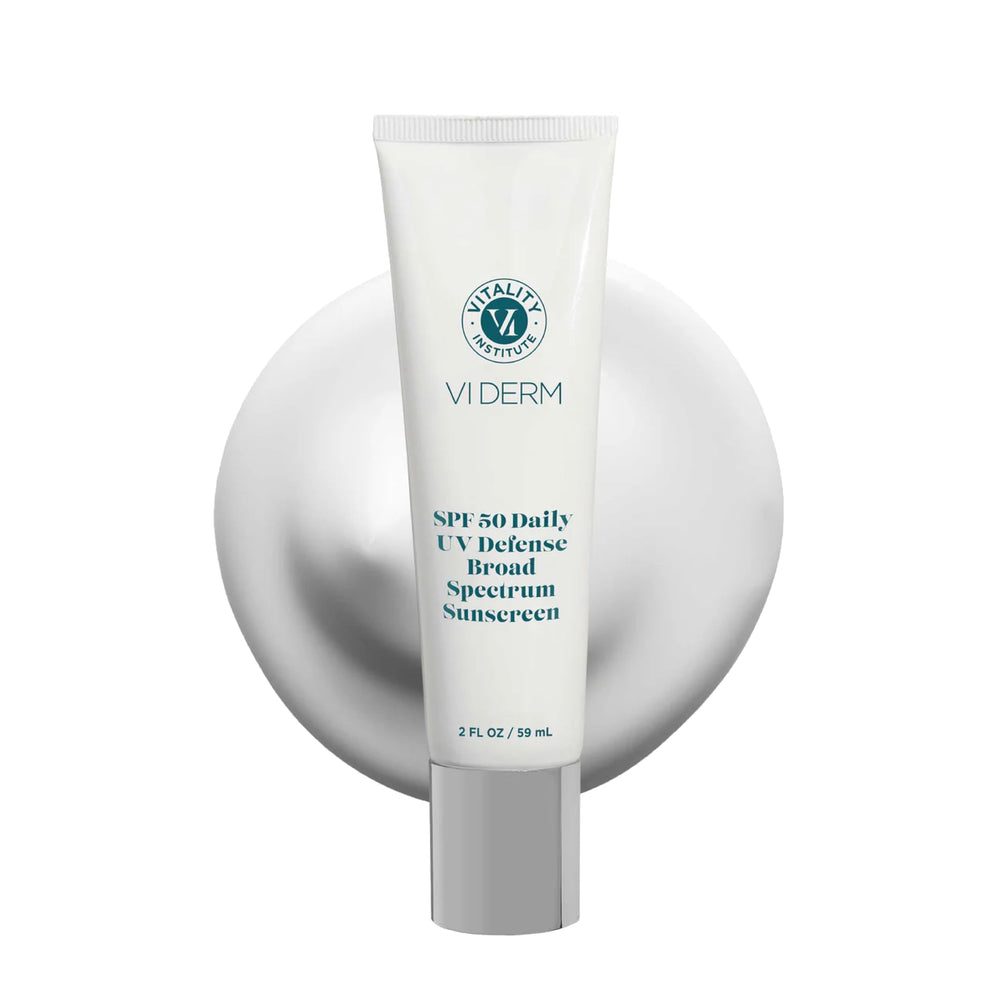 VI DERM SPF50 Daily UV Defense bottle shows clean, fragrance-free sun protection.