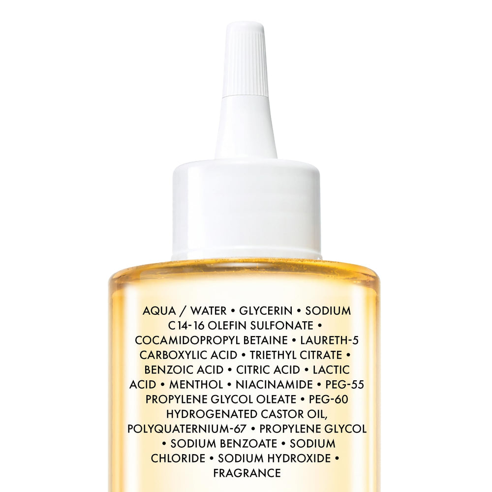 VICHY Dercos bottle on a bathroom shelf in a lifestyle setting, promoting daily use
