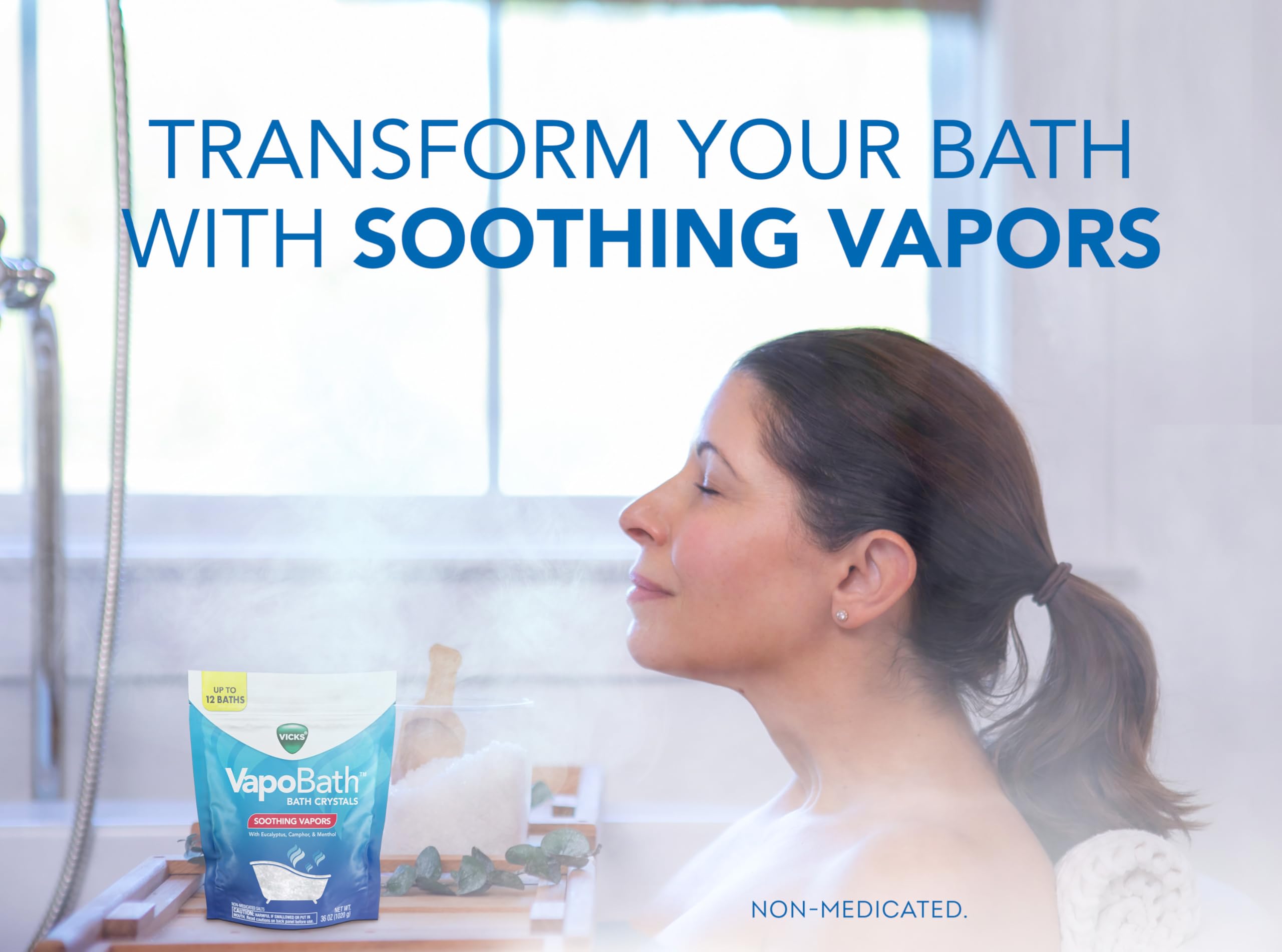 Vicks VapoBath crystals dissolving in tub, releasing comforting non-medicated vapors.