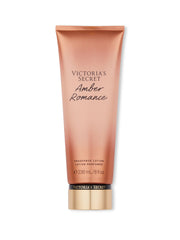 Victoria's Secret Amber Romance lotion packaging close-up for fragrance layering.
