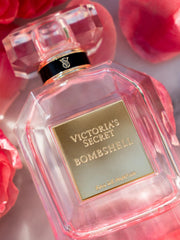 Victoria's Secret Bombshell EDP 3-4oz bottle label close-up shows premium packaging.