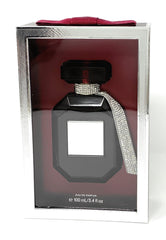 Victoria's Secret Bombshell Midnight bottle closeup highlights luxe glass and warm notes.