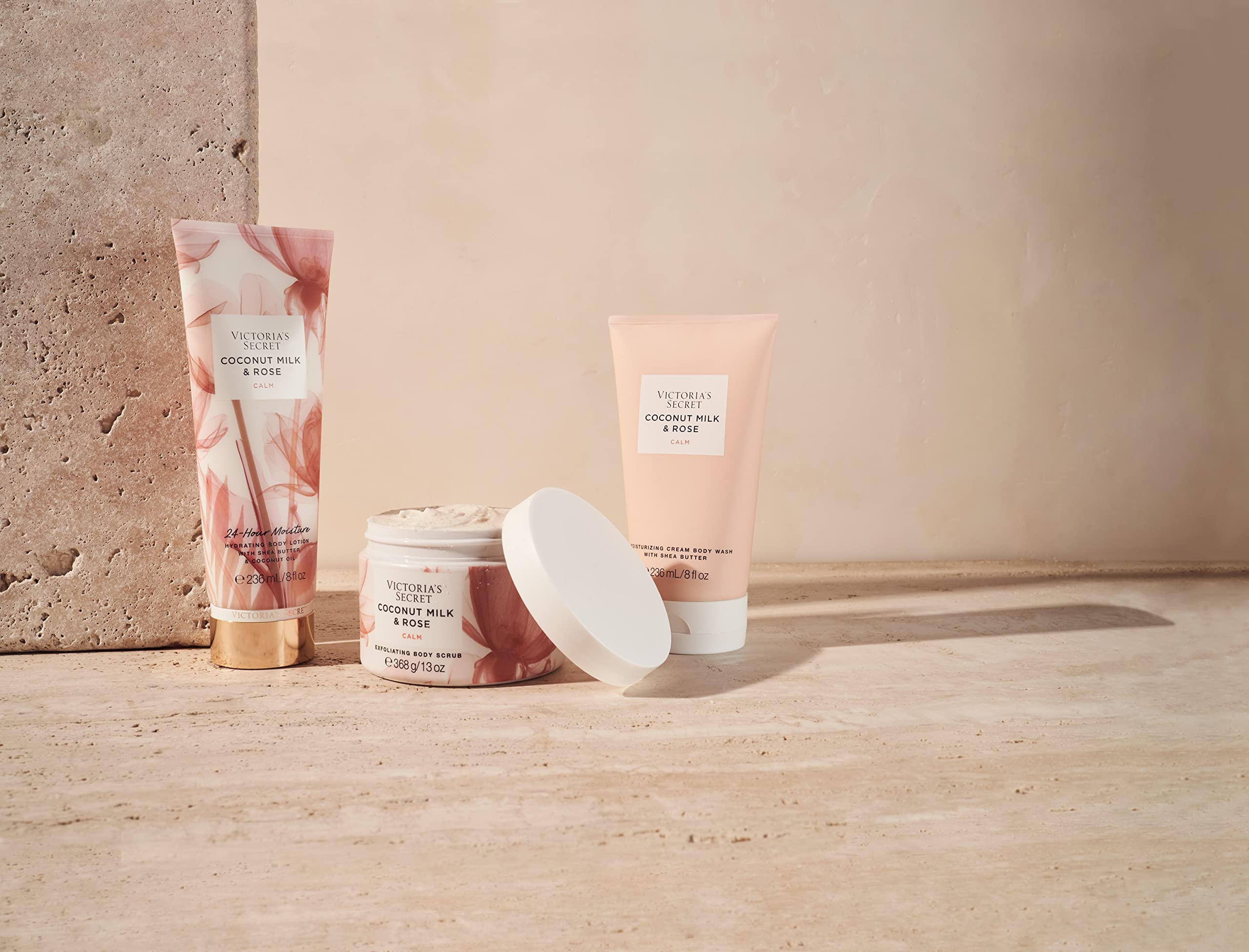 Victoria's Secret Coconut Milk and Rose lotion cream in hand shows smooth skin after application.