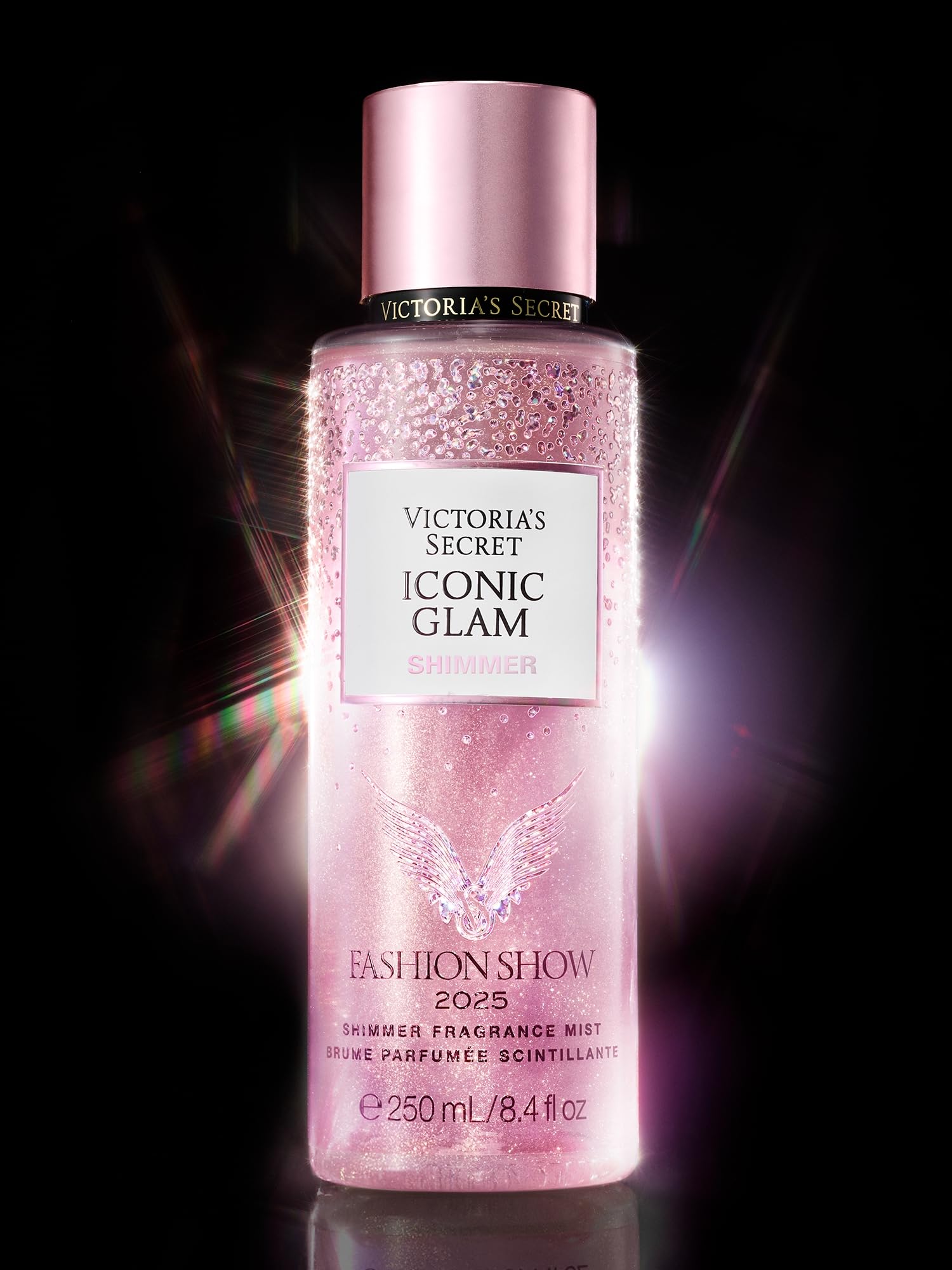 Victoria's Secret Fashion Show Iconic Glam Shimmer Mist palm shot for easy on-the-go refresh.