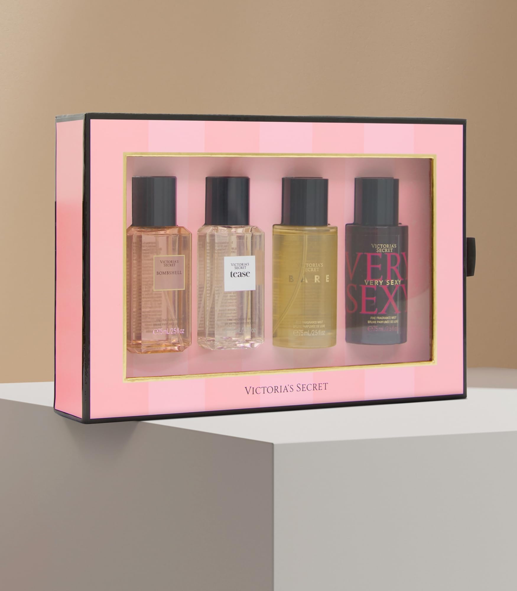 Victoria's Secret fragrance mist bottles close-up highlighting travel-friendly mini sizes.