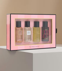 Victoria's Secret fragrance mist bottles close-up highlighting travel-friendly mini sizes.