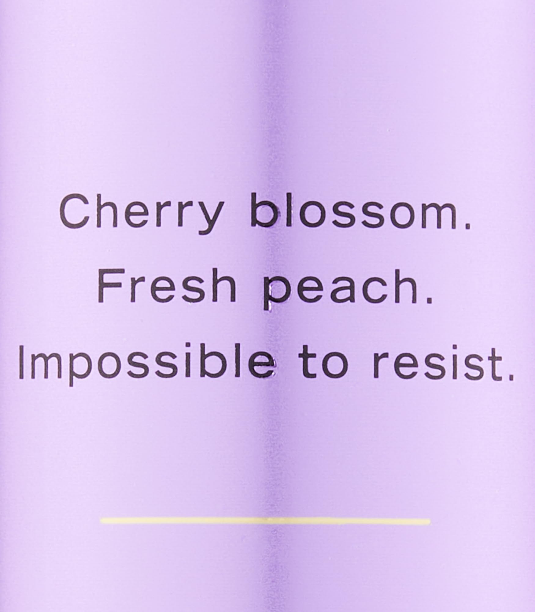 Victoria's Secret Love Spell spray action shows light mist for pulse-point use.