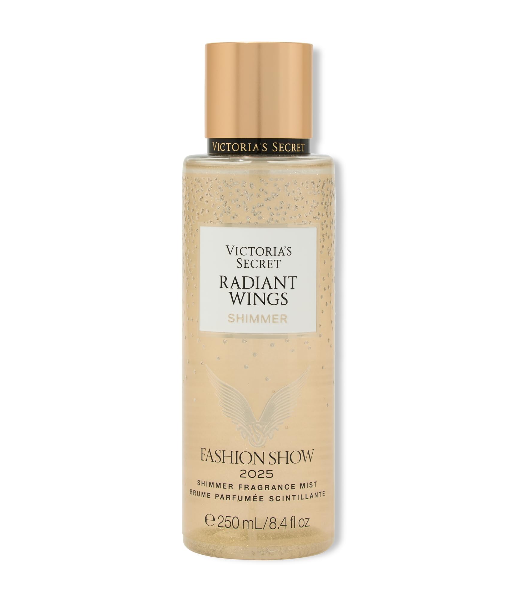Victoria's Secret Radiant Wings bottle close-up, showcasing shimmering floral gourmand fragrance for the skin.