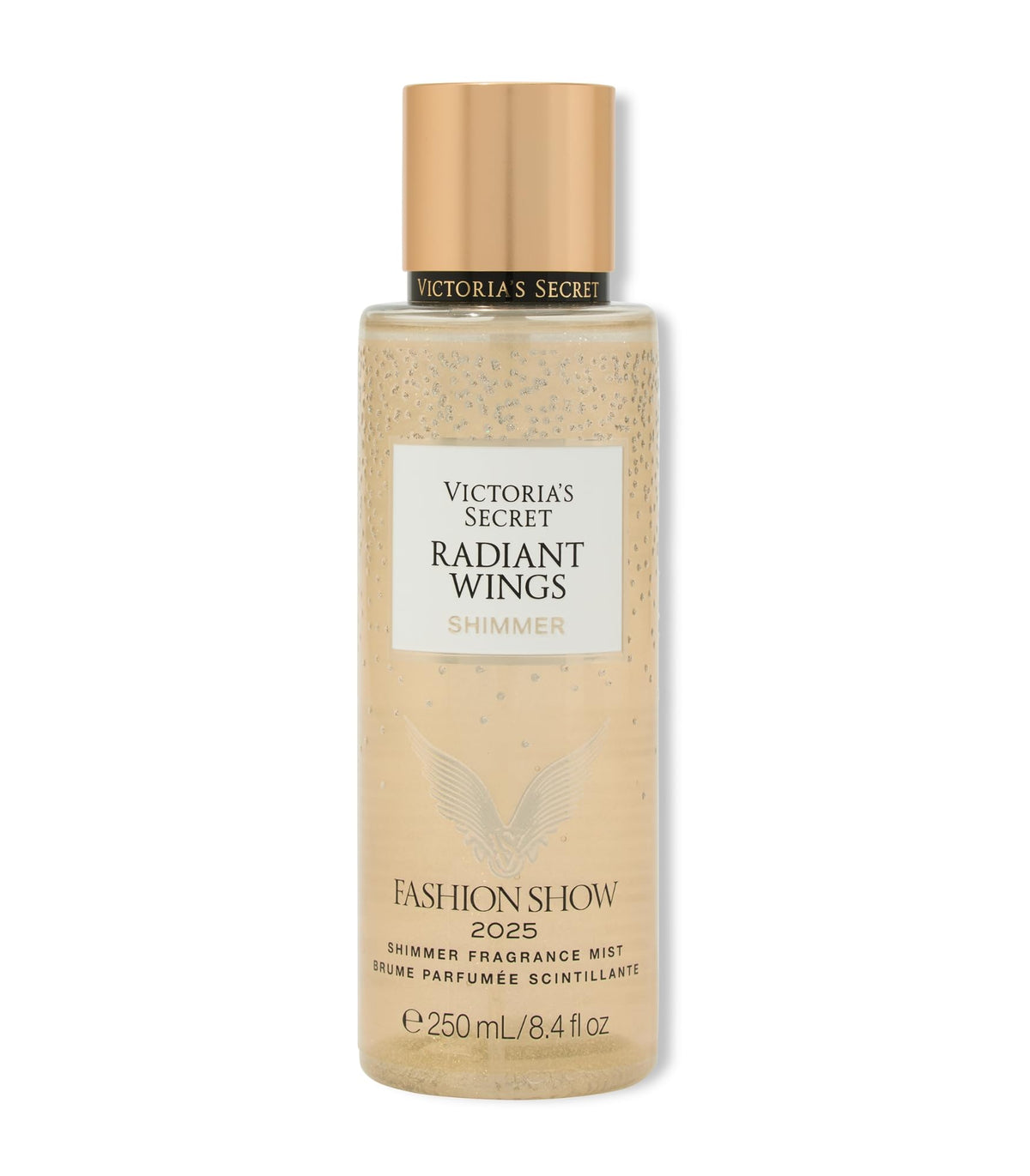 Victoria's Secret Radiant Wings bottle close-up, showcasing shimmering floral gourmand fragrance for the skin.