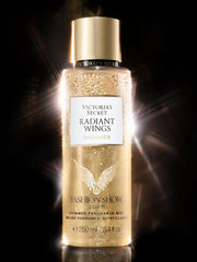 Radiant Wings bottle on a tidy vanity with soft lighting and mirror.