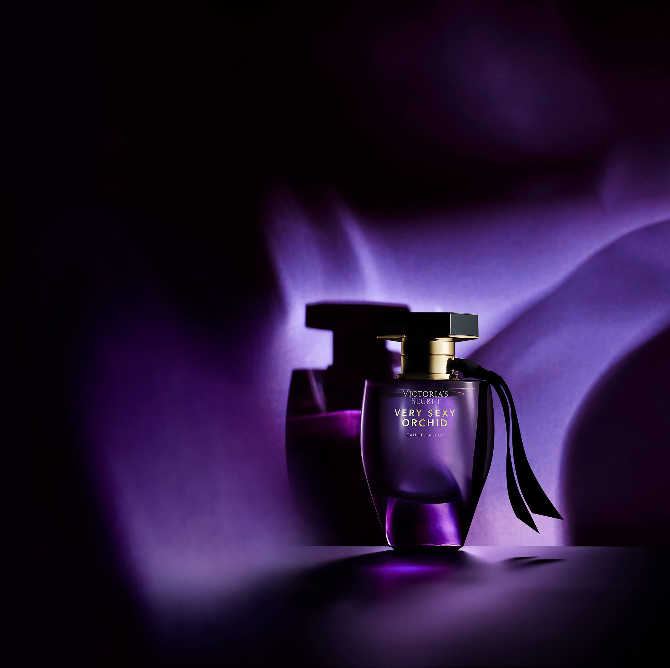 Victoria's Secret Very Sexy Orchid bottle display suggesting date night aroma
