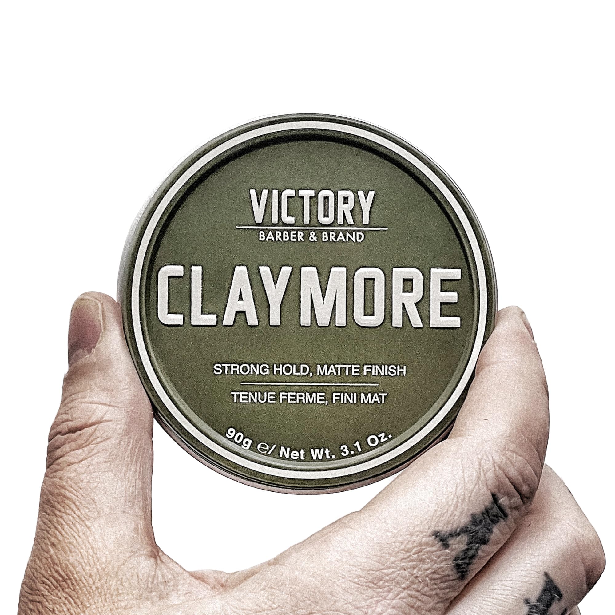 Closeup canister of Claymore packaging and ergonomic grip