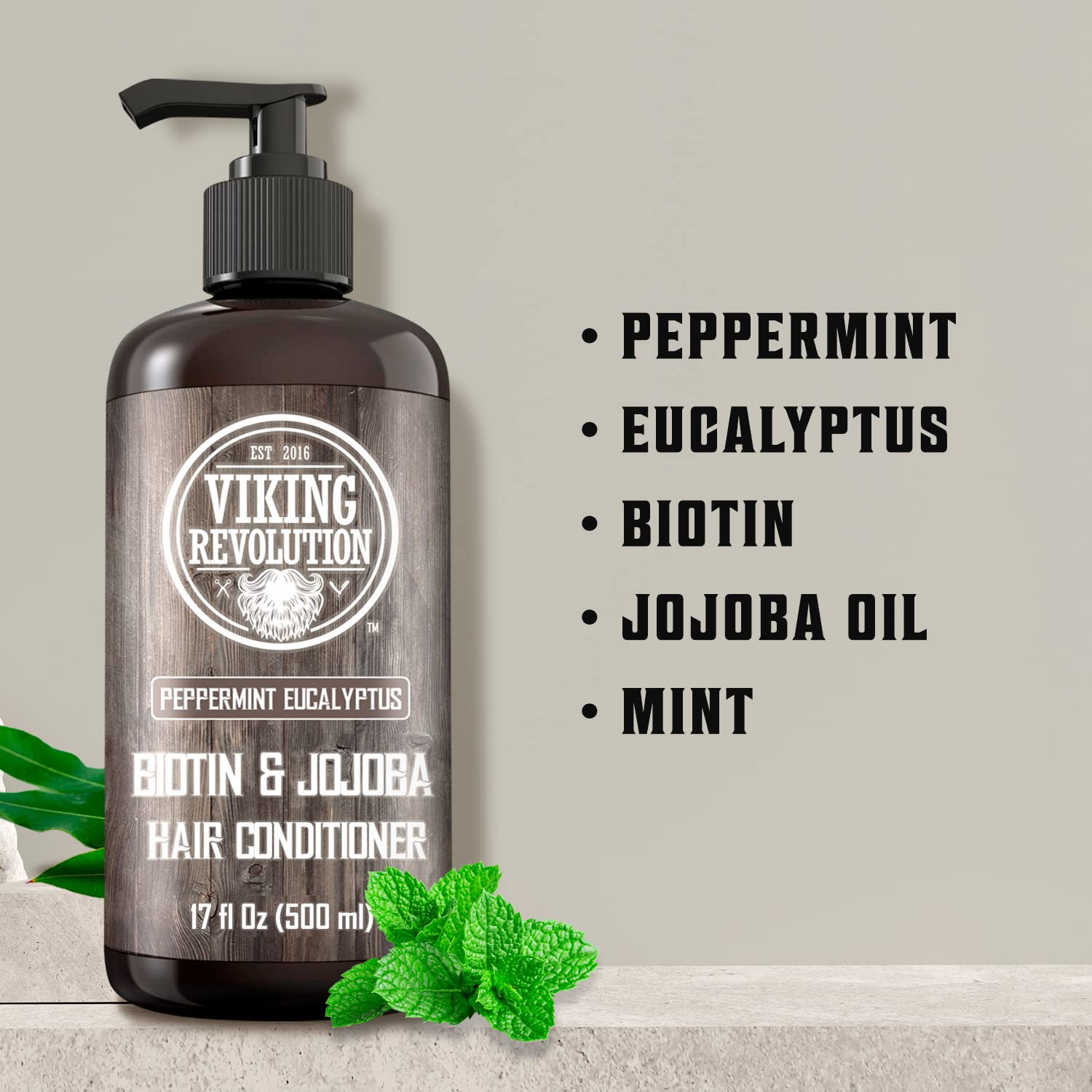 Viking Revolution Biotin conditioner label closeup highlights fresh scent and nourishing oils.