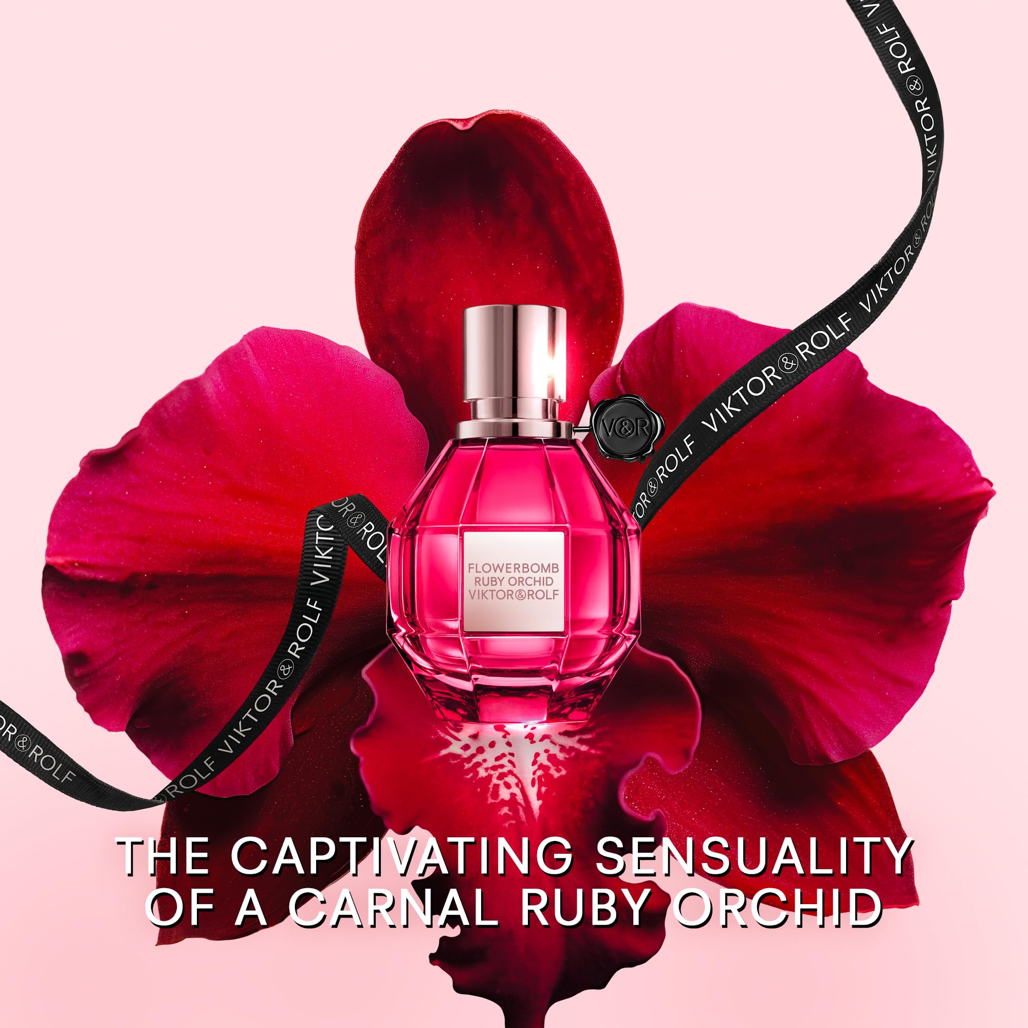 Viktor&Rolf Flowerbomb Ruby Orchid 3.4 oz display shows signature silhouette.
