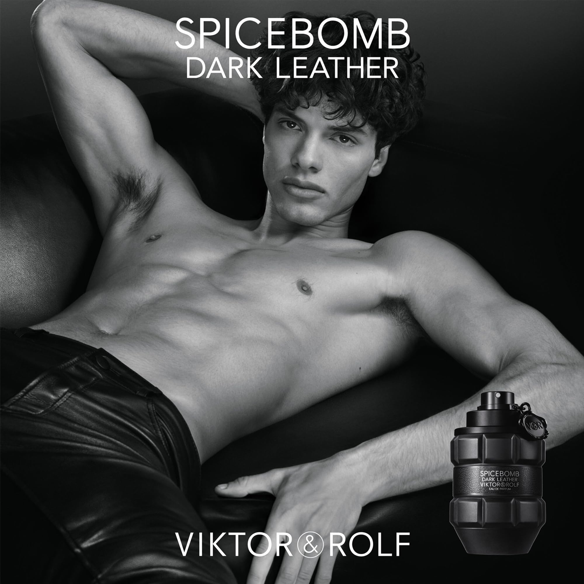 Viktor&Rolf Spicebomb Dark Leather bottle in use for warm pulse-point application and lasting scent.