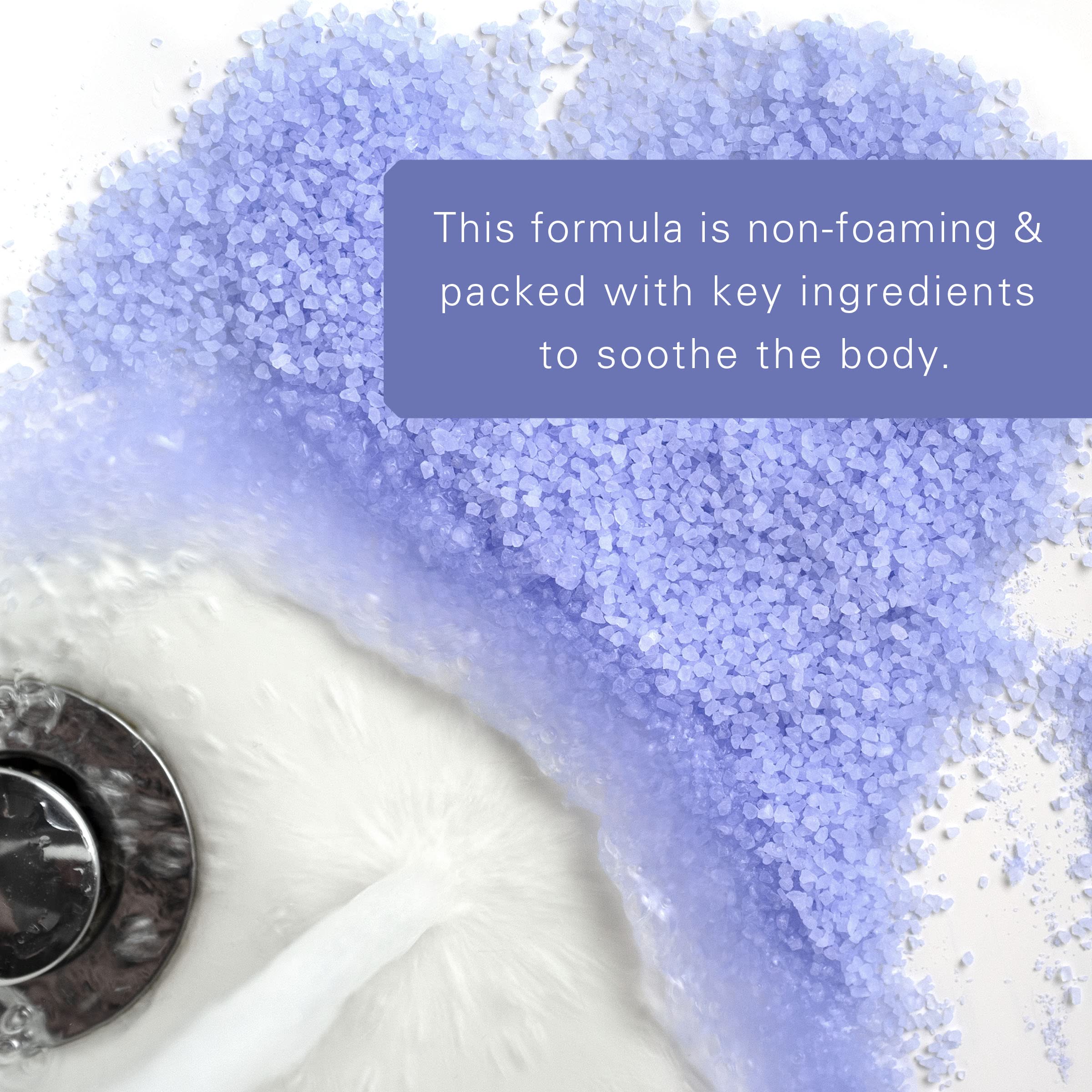 Village Naturals Therapy full-bath scene with foamy water for a relaxing home spa.