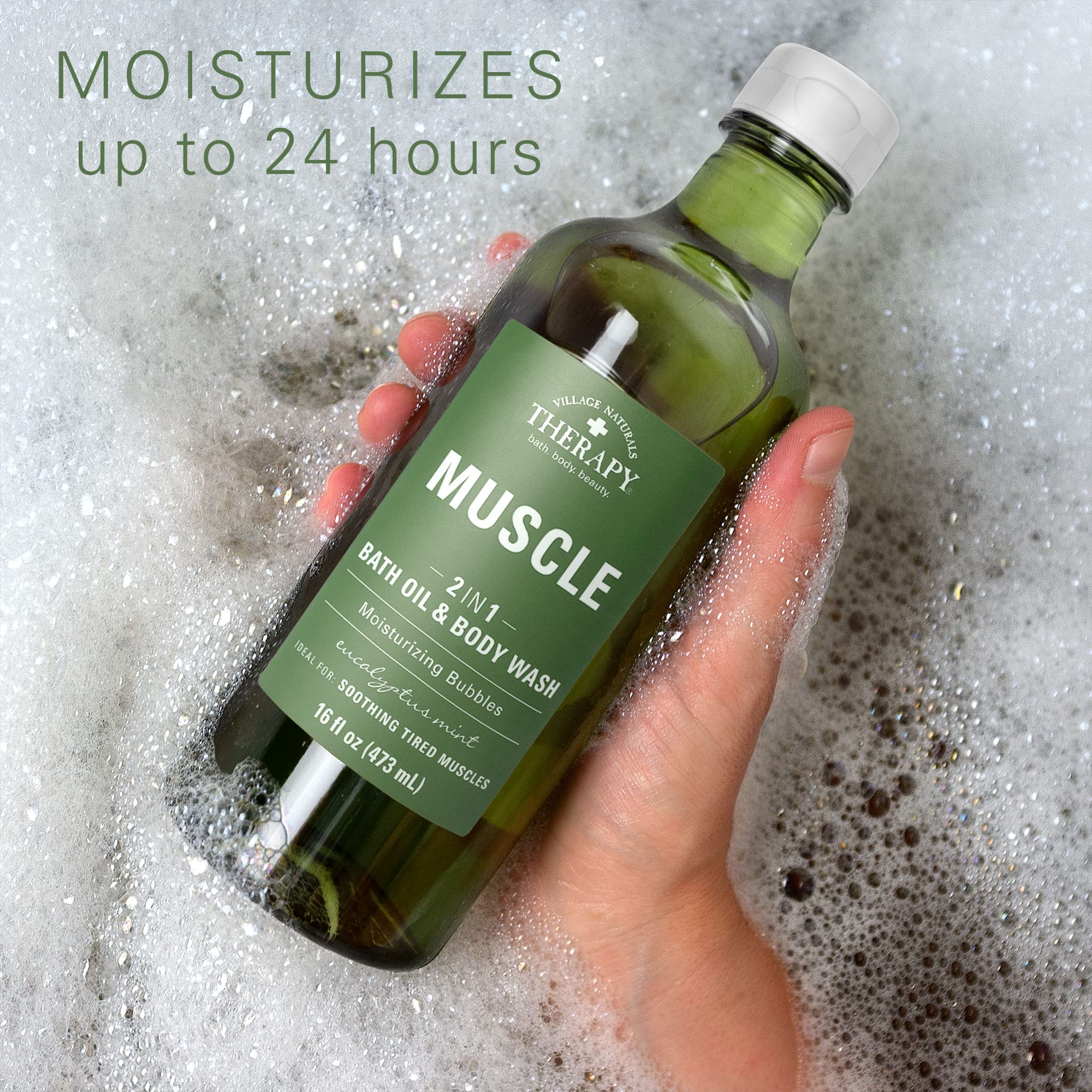 Village Naturals Therapy Muscle Foaming Bath Oil label shows USA-made cruelty-free claim.