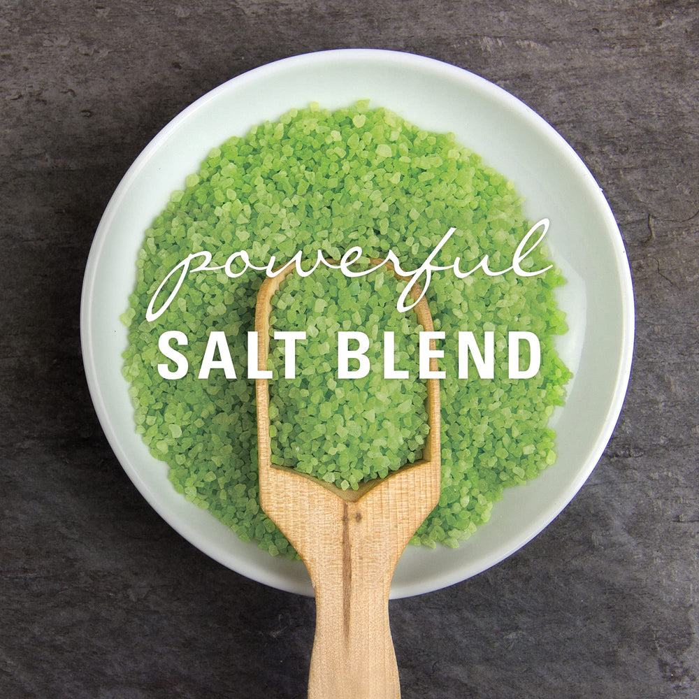 Village Naturals Therapy mint-labeled lid close-up evokes energizing post-shower routine