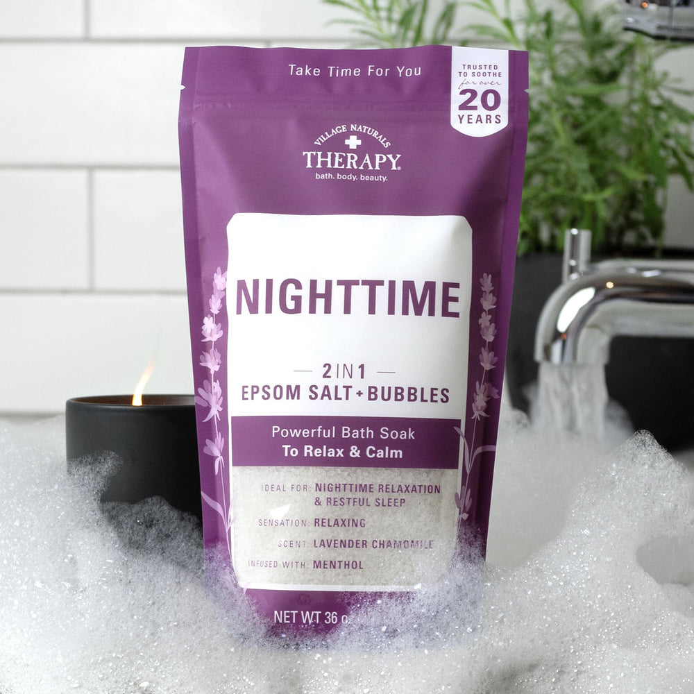 Village Naturals Therapy Nighttime Foaming Epsom Soak closeup of Epsom salt and blend
