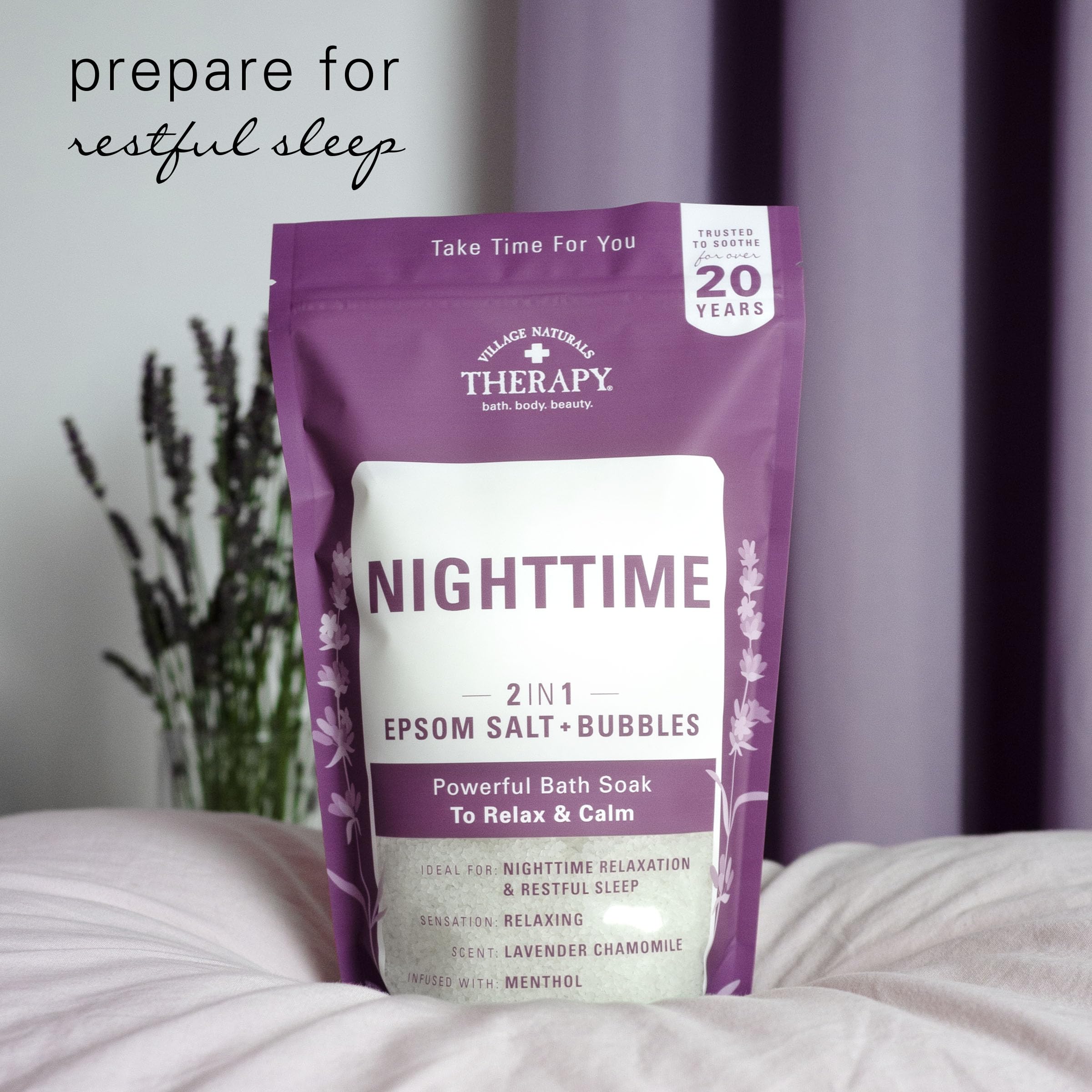 Village Naturals Therapy Nighttime Foaming Epsom Soak in-tub scene inviting a soothing soak