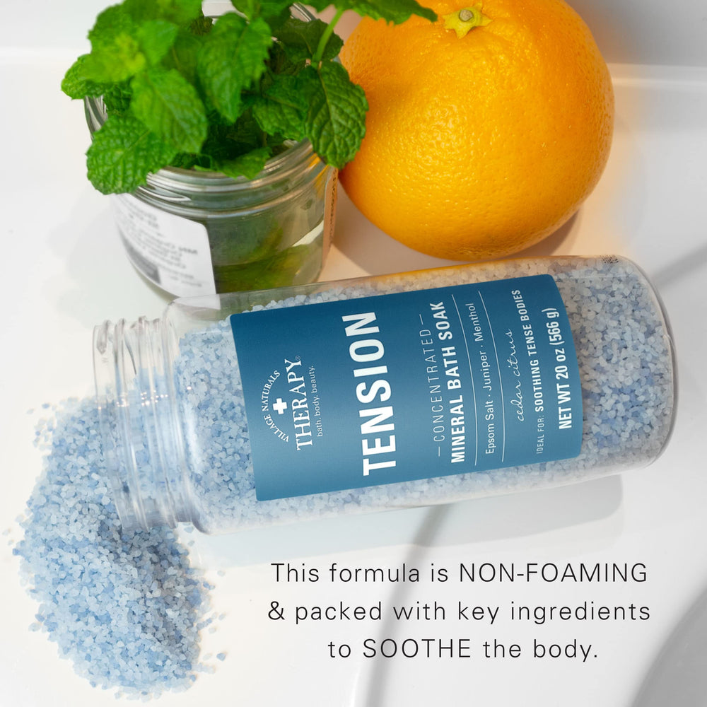 Village Naturals Therapy Tension Bath Soak foot-bath scene for quick relaxation after a long day