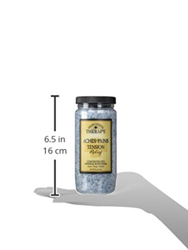Village Naturals Therapy Tension Bath Soak measuring caps shown for precise use