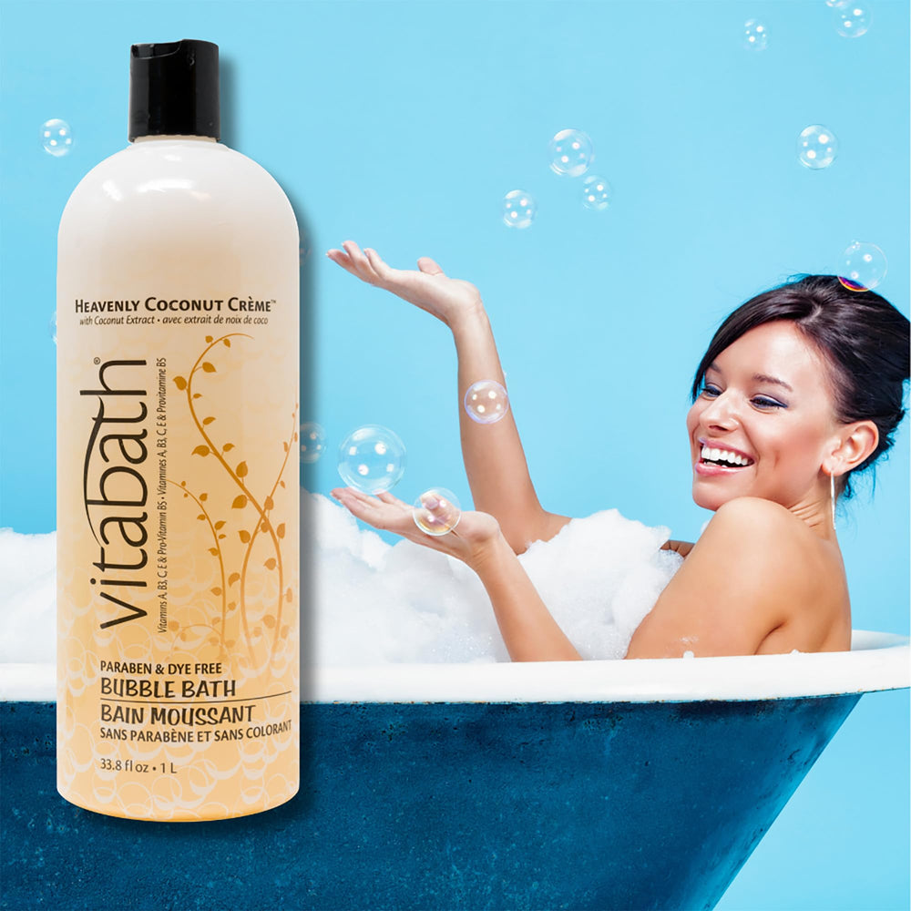 Pour shot of Vitabath Heavenly Coconut Creme Bubble Bath releasing tropical scent.