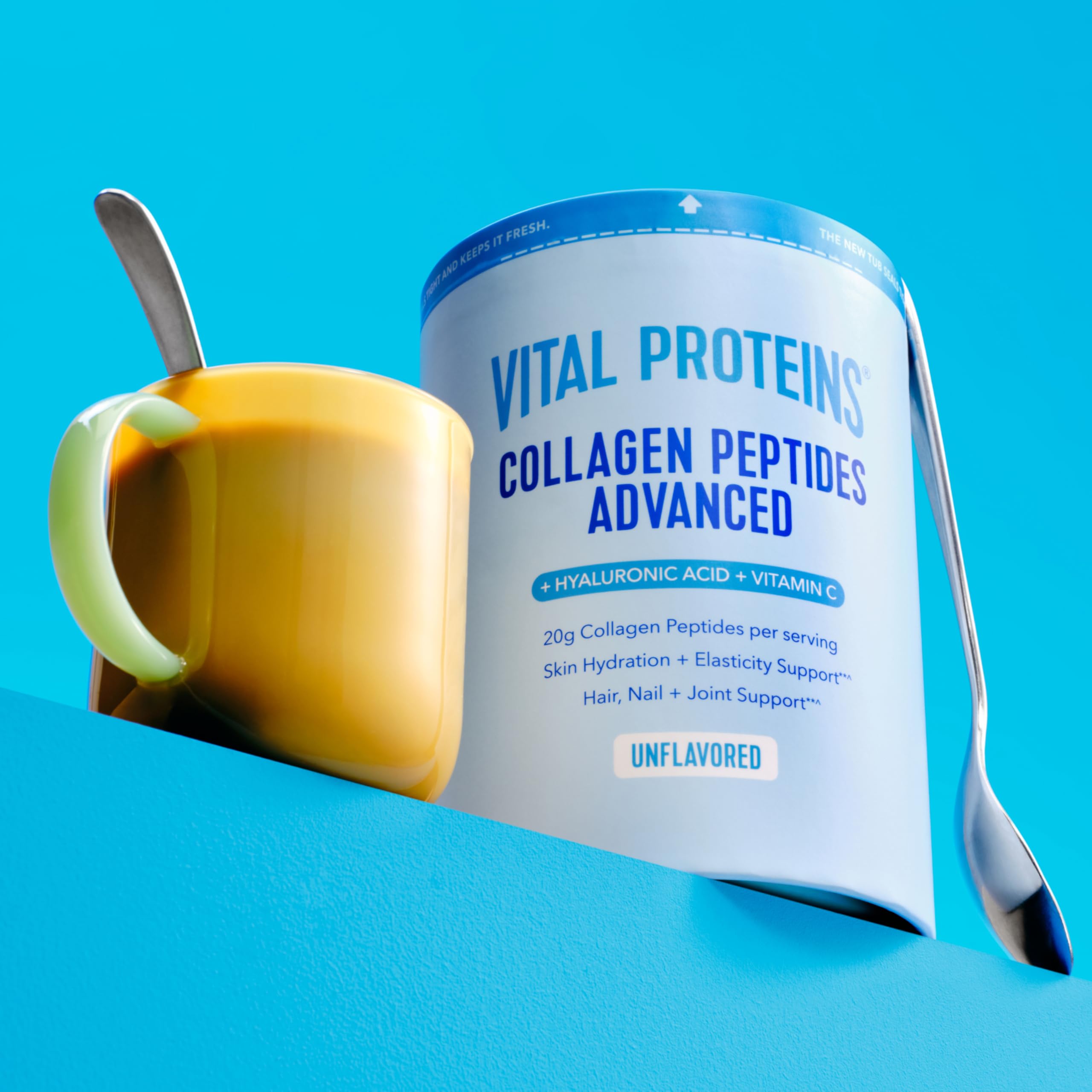 Vital Proteins open jar with spoonful of powder for easy scooping