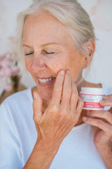 Vitality Skin Envy Balm in use on forearm demonstrates quick moisturization