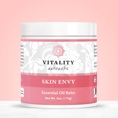 Vitality Skin Envy Balm ingredients close-up highlighting nourishment from beeswax and coconut oil