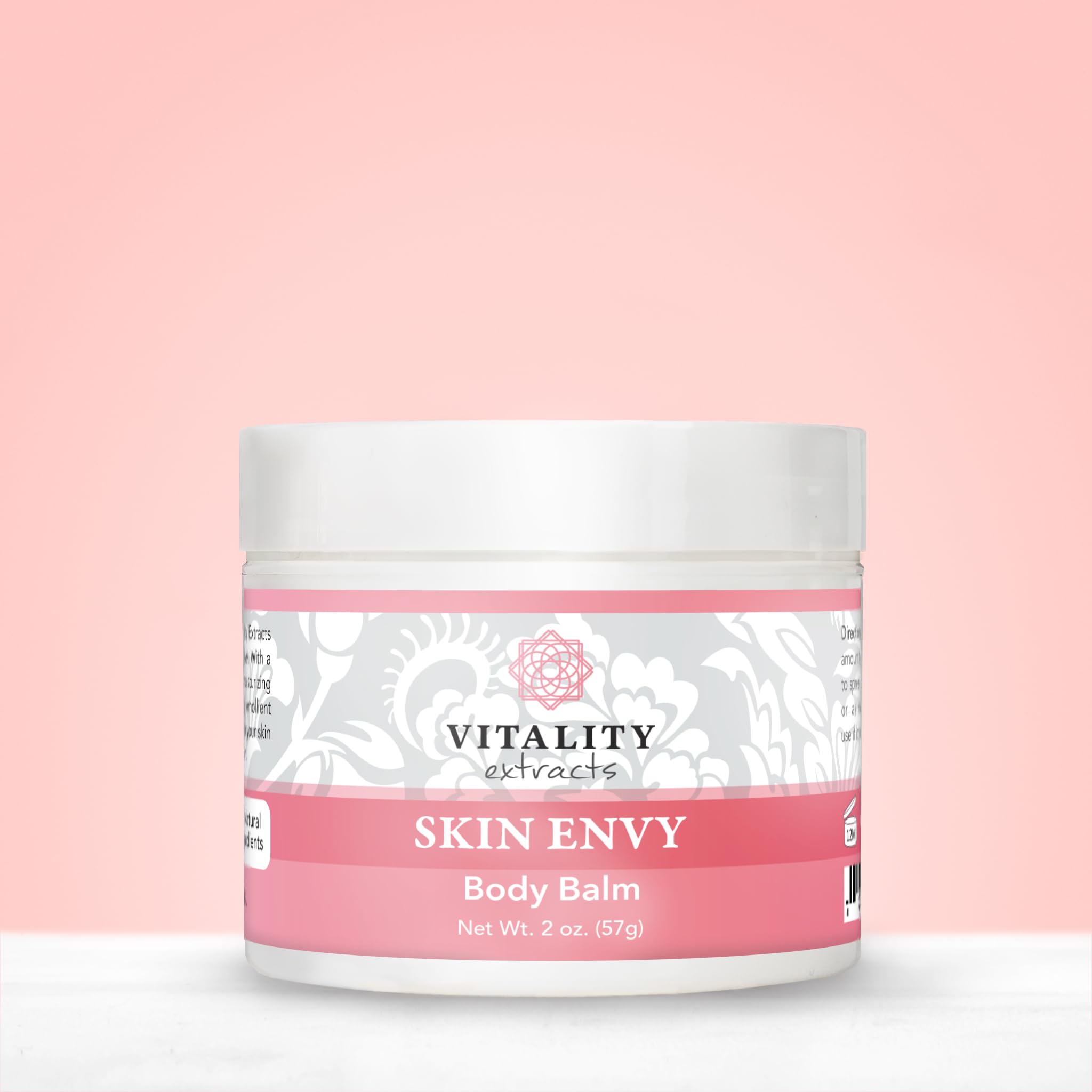 Vitality Skin Envy Balm ingredients flat lay highlighting natural oils and beeswax
