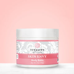 Vitality Skin Envy Balm ingredients flat lay highlighting natural oils and beeswax