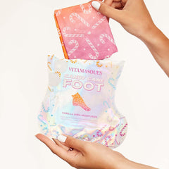 Vitamasques Candy Cane Foot Mask nourishes dry heels with Shea Butter.