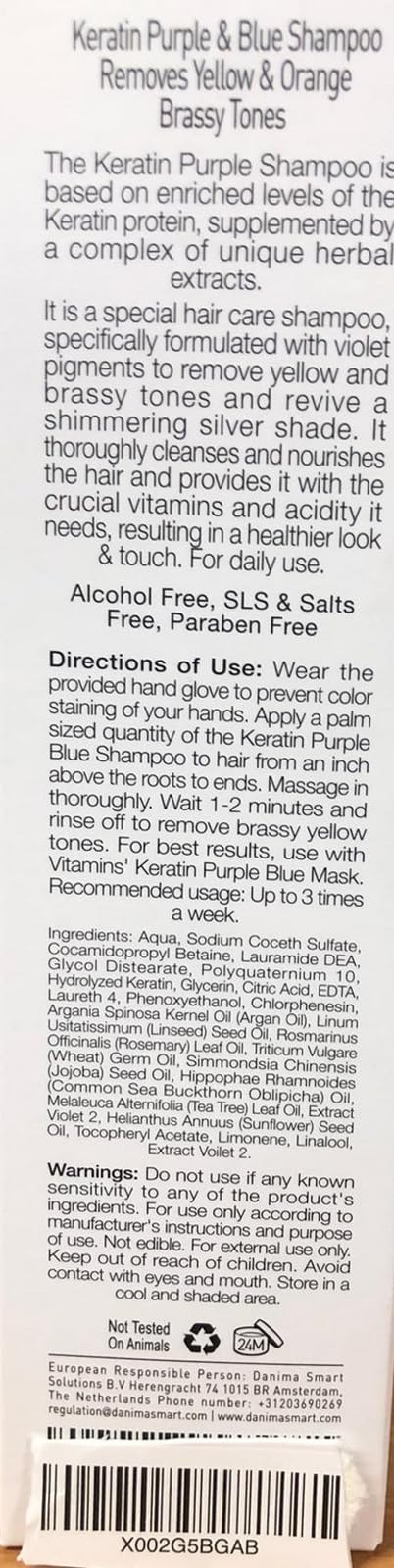 VITAMINS keratin purple shampoo bottle on sleek hair demonstrates smooth, shiny finish.