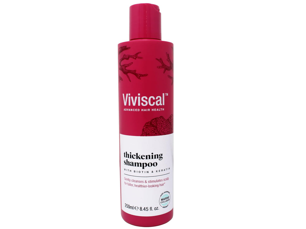 Viviscal conditioner close-up on silky hair strands after use reduces breakage.