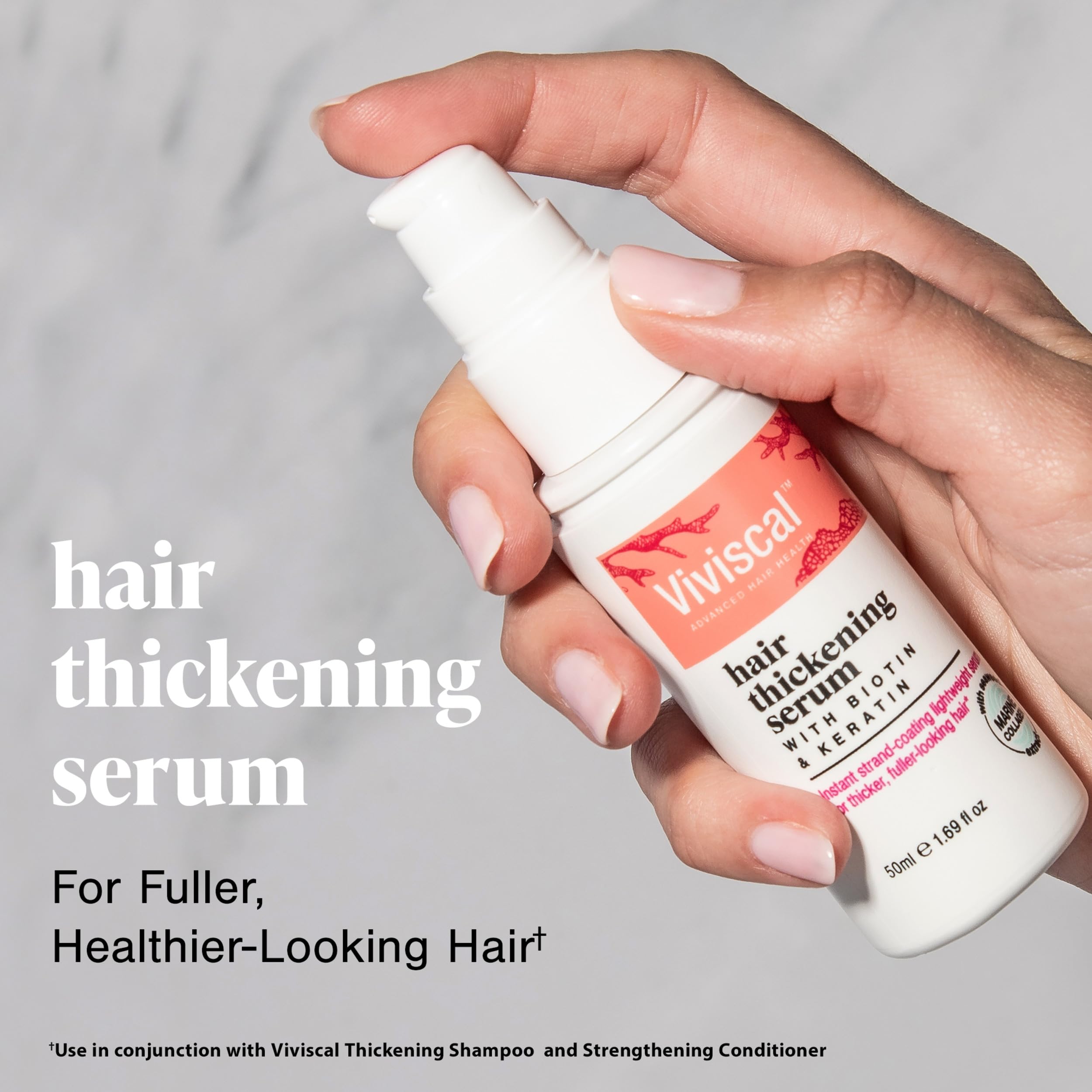 Viviscal Hair Thickening Serum application on hair strands for light leave-in styling