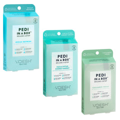 VOESH Pedi in a Box Ocean Refresh packaging highlights a refreshing foot care ritual in a compact box.