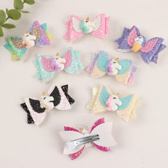Volepet unicorn bows 3in glitter clip attaches to headbands or clothing.