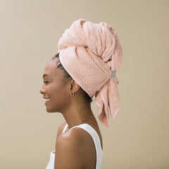 VOLO Hero Cloud Pink Hair Towel snug strap demonstrates secure wrap during routine post shower.