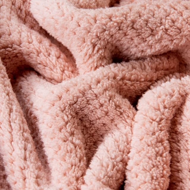 VOLO Nanoweave detail highlights 10x water weight absorption in the Cloud Pink towel.